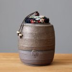 Ancienne boite à thé en poterie décorative