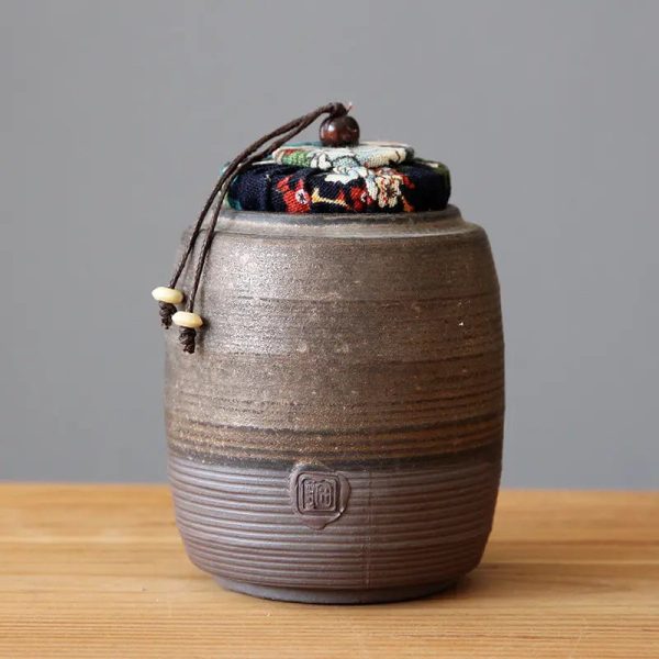 Ancienne boite à thé en poterie décorative