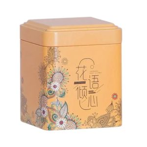 Boîte à thé en métal orange avec motifs floraux