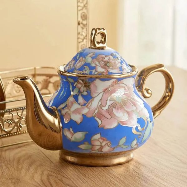 Théière en porcelaine bleue et dorée