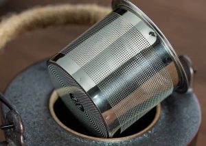 Théière noire en céramique, idéale pour le thé en toute élégance