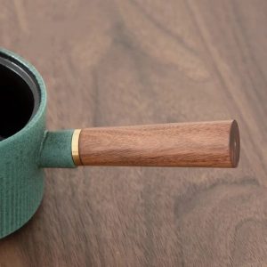 Théière en céramique turquoise pour infuser le thé