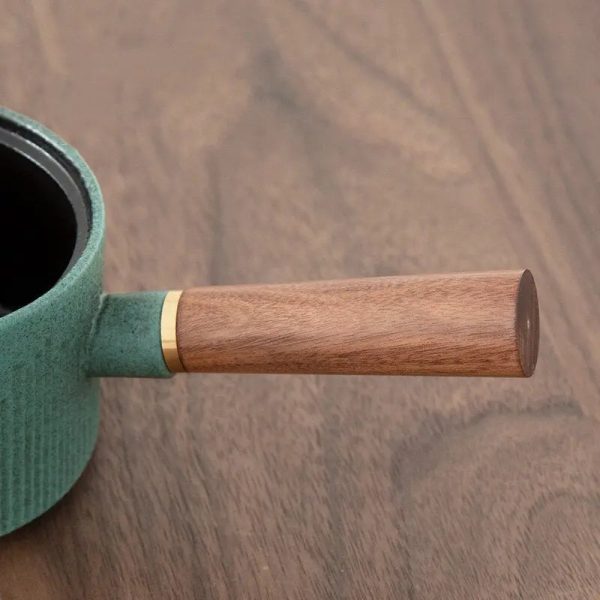 Théière en céramique turquoise pour infuser le thé
