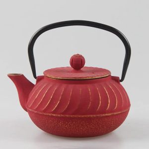 Théière en fonte décorée de reliefs dorés, 700ml