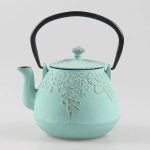 Théière Japonaise élégante en fonte décorée de fleurs