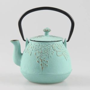 Théière Japonaise élégante en fonte décorée de fleurs