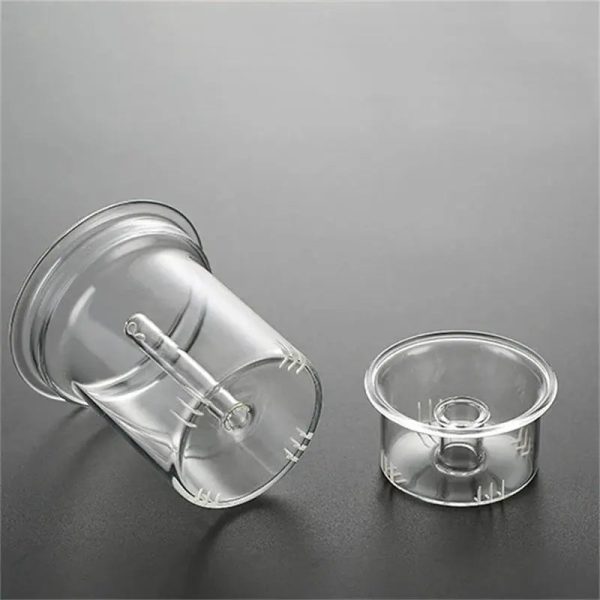 Théière transparente grise pour un service raffiné