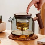 Théière en verre et bois ronde 700ml avec bouton infuseur