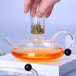 Théière en verre design avec infuseur intégré