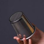 Théière en fonte noire, élégance et fonctionnalité