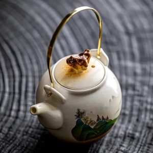 Théière design en porcelaine avec peinture paysage